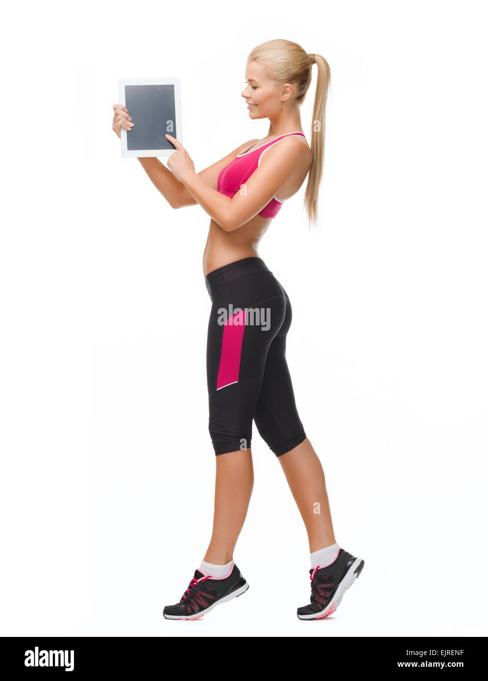 Sportivo da donna con i tablet pc Foto Stock