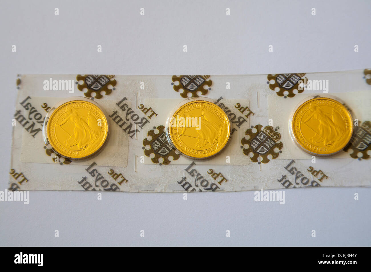 Tre Britannia 2014 UK trimestre oncia fine Gold Bullion monete non circola nuove monete d oro Foto Stock