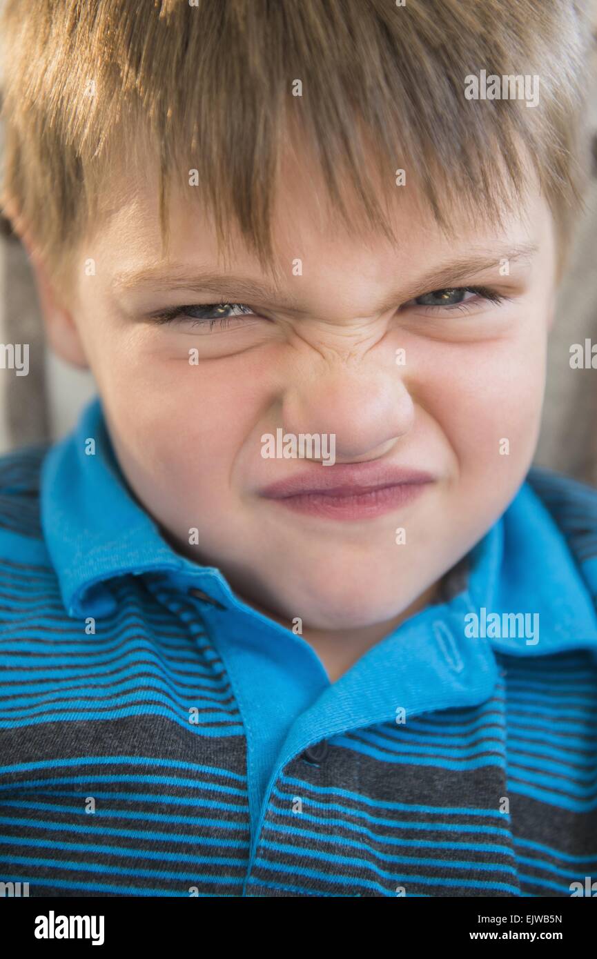 Ritratto di frustrati ragazzo (6-7) Foto Stock