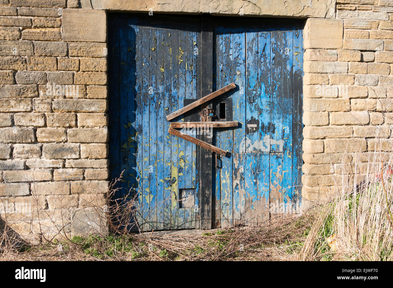 Il vecchio magazzino porta al pontile, Sowerby Bridge, West Yorkshire Foto Stock