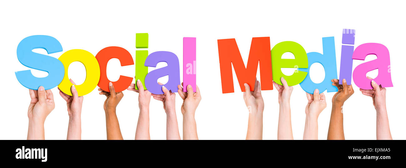 Multi-Ethnic gruppo di persone che sostengono il Word Social Media Foto Stock