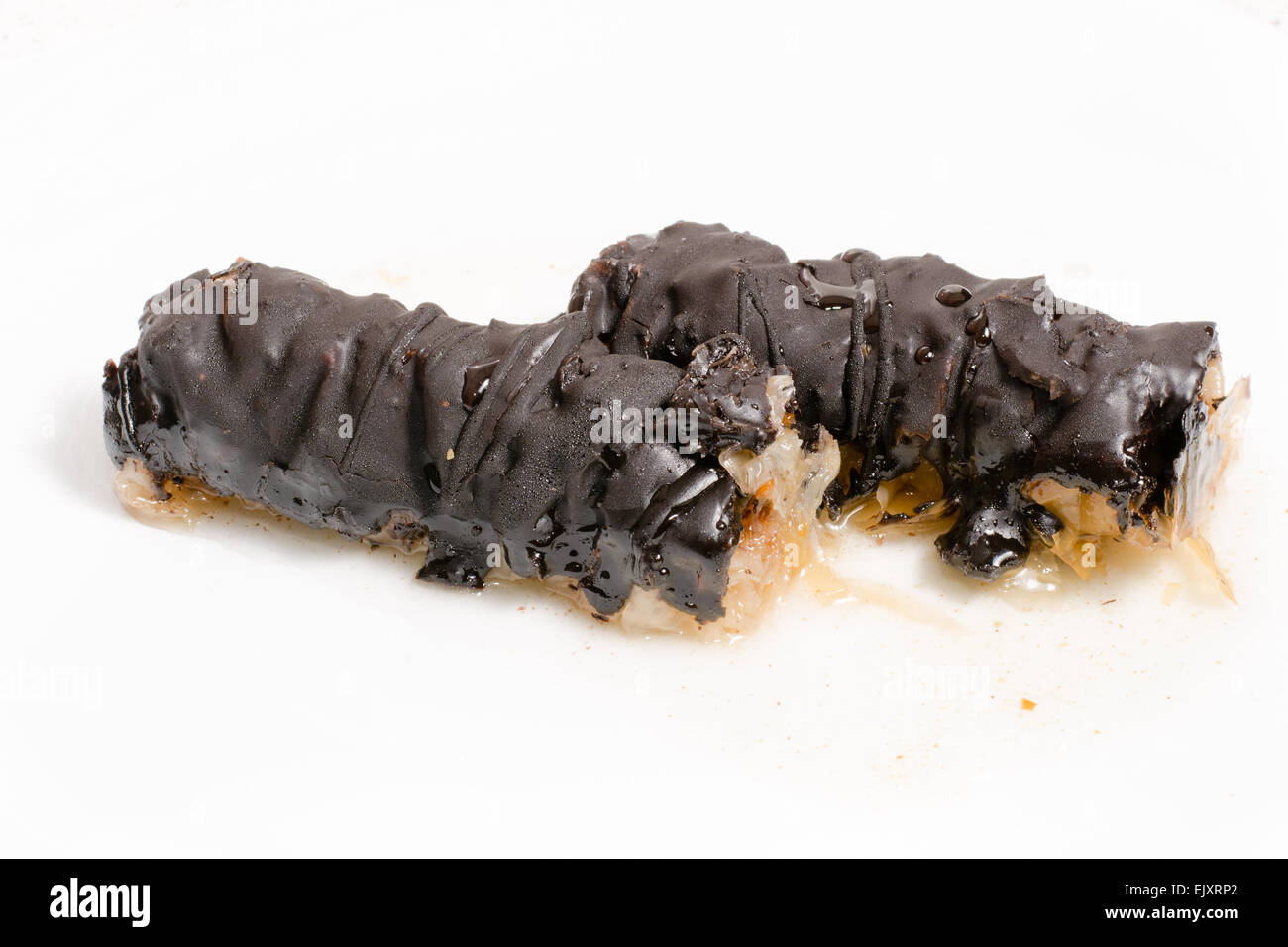 Il Baklava schizzato con cioccolato isolato su sfondo bianco Foto Stock