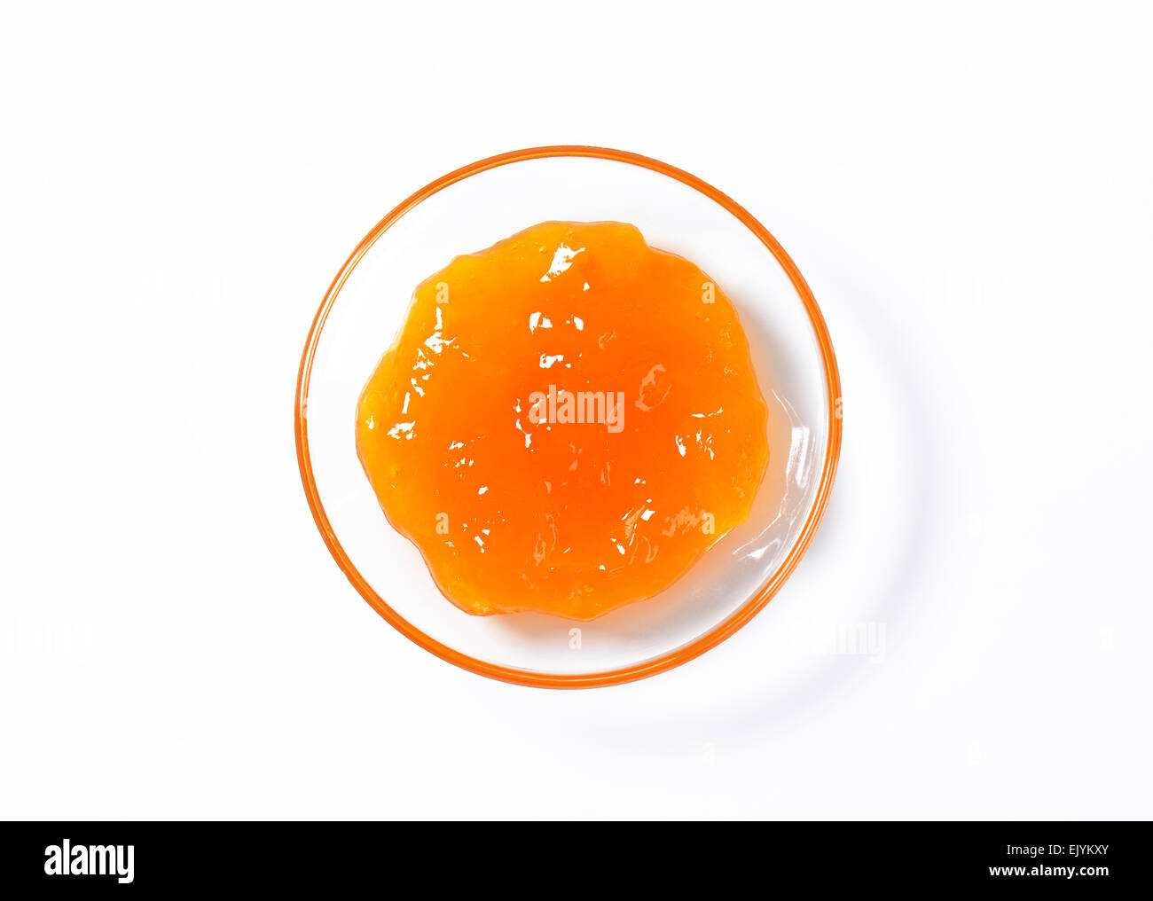Confettura di albicocche sulla piccola piastra di vetro Foto Stock
