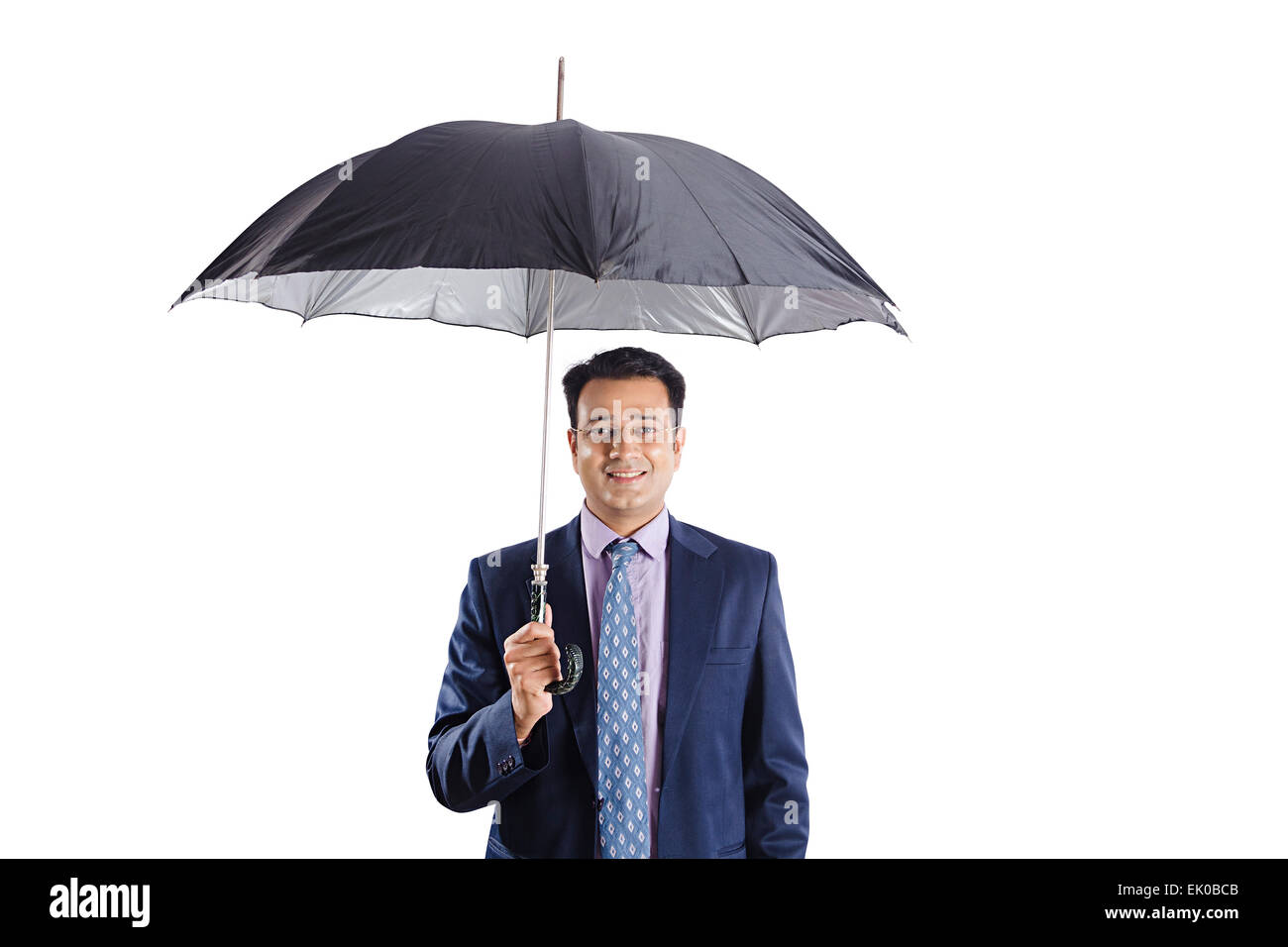 1 Commerciante indiano di protezione dalla pioggia Foto Stock