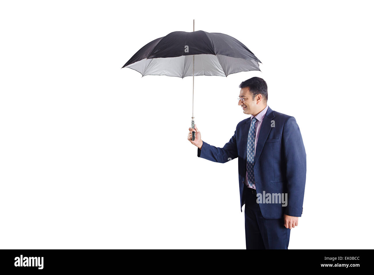 1 Commerciante indiano di protezione dalla pioggia Foto Stock