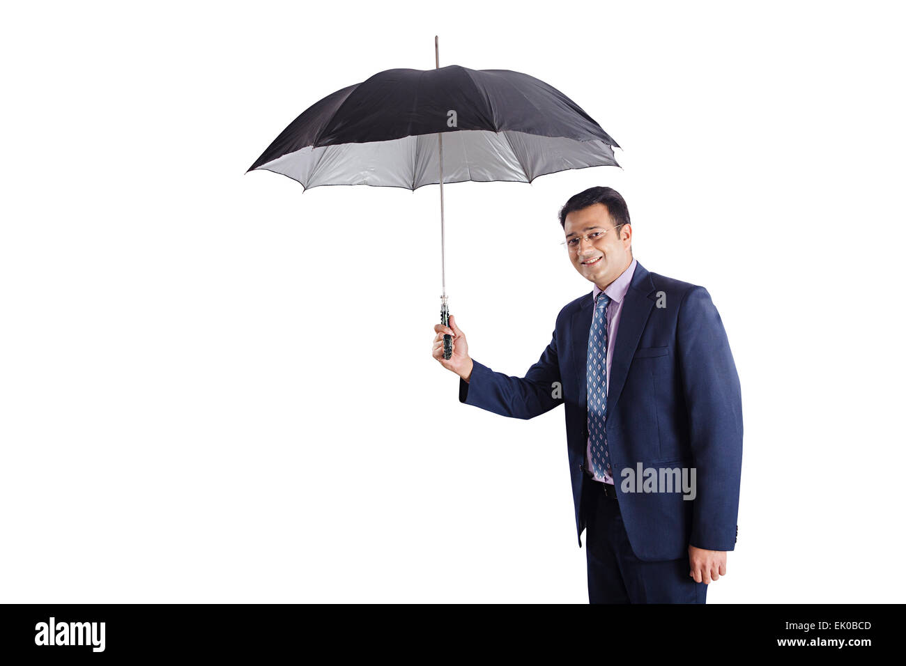 1 Commerciante indiano di protezione dalla pioggia Foto Stock