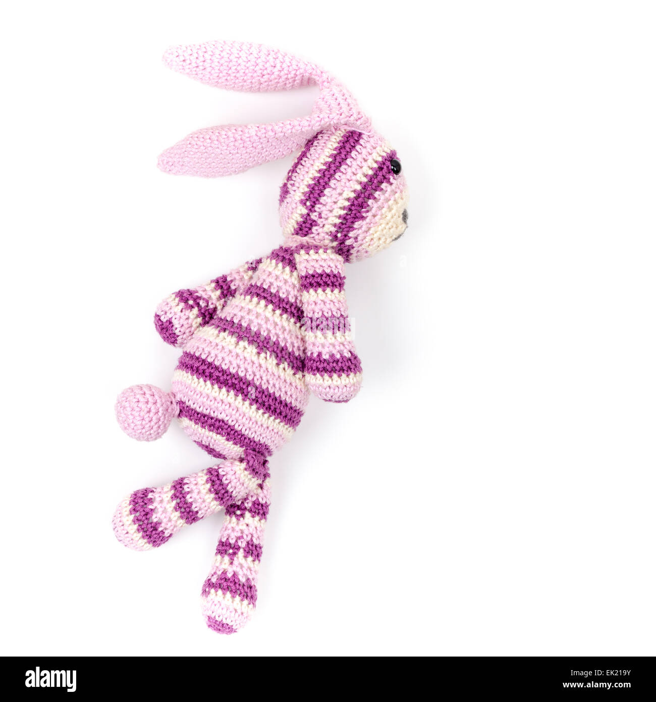 Maglia giocattolo di coniglio è in esecuzione veloce, closeup photo isolati su sfondo bianco Foto Stock