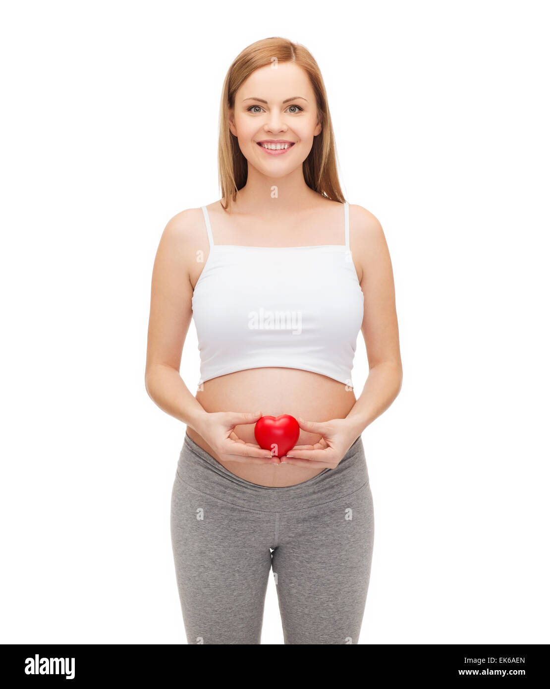 Un futuro felice madre holding piccolo cuore rosso Foto Stock