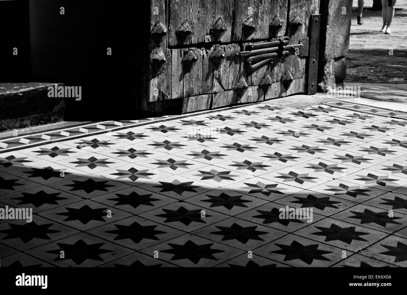 Antiche piastrelle per pavimento pieno di stelle, Malaga, Spagna Foto Stock