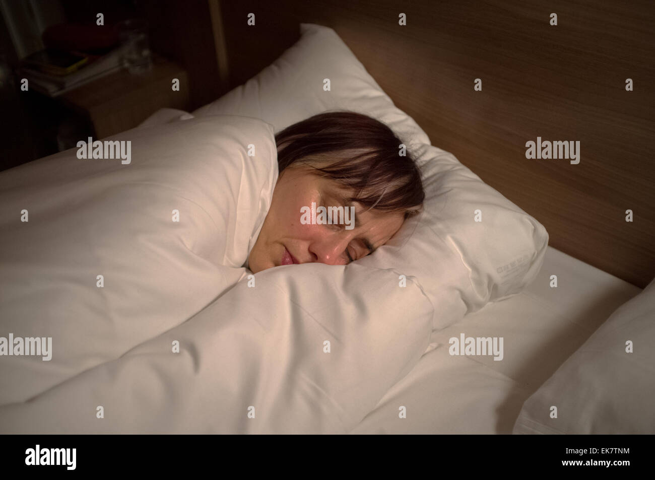 Una donna addormentata. Foto Stock