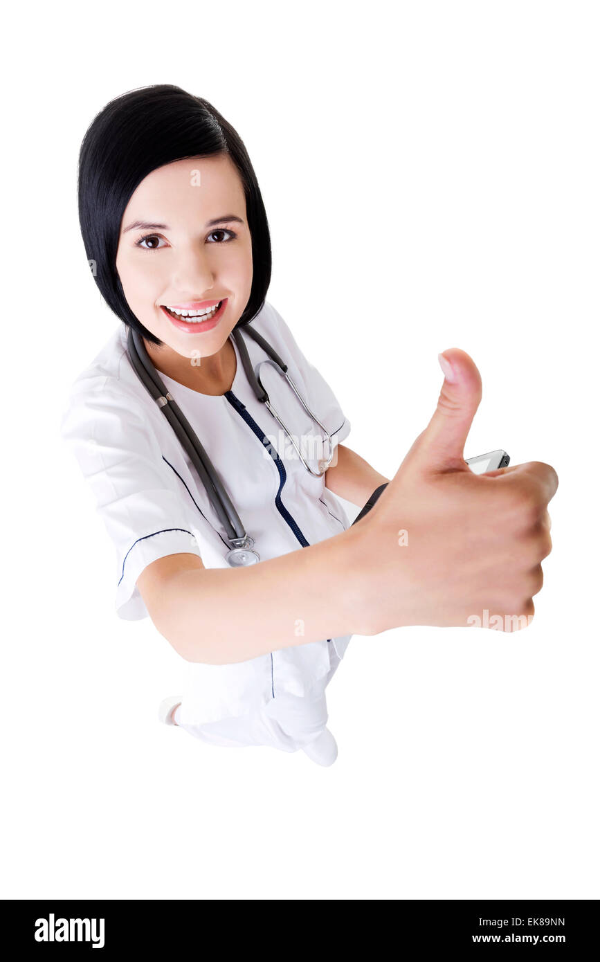 Giovani donne medico o infermiere gesticolando OK Foto Stock