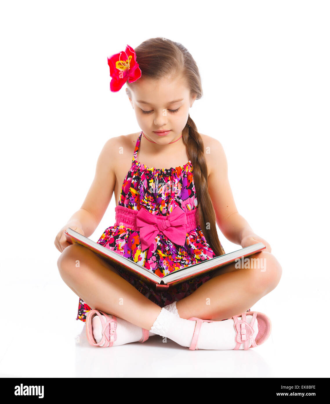 Felice bambina con libro Foto Stock