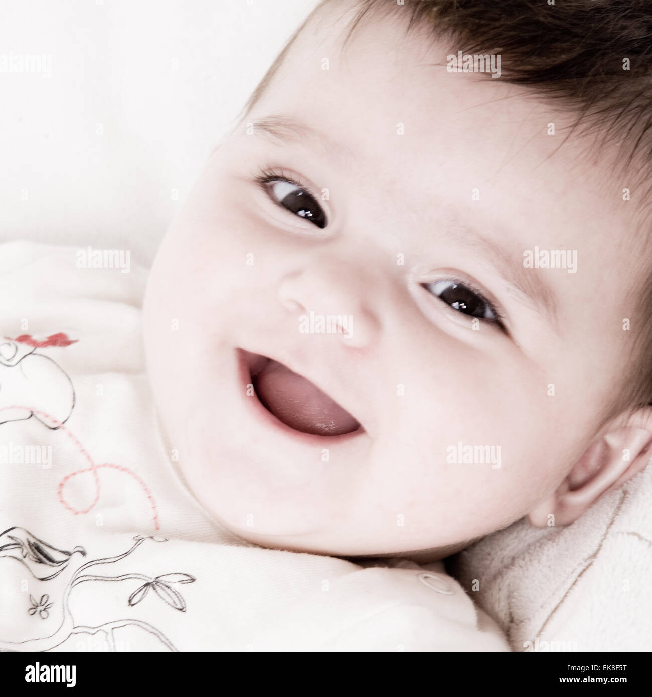 Sorridente happy baby Foto Stock