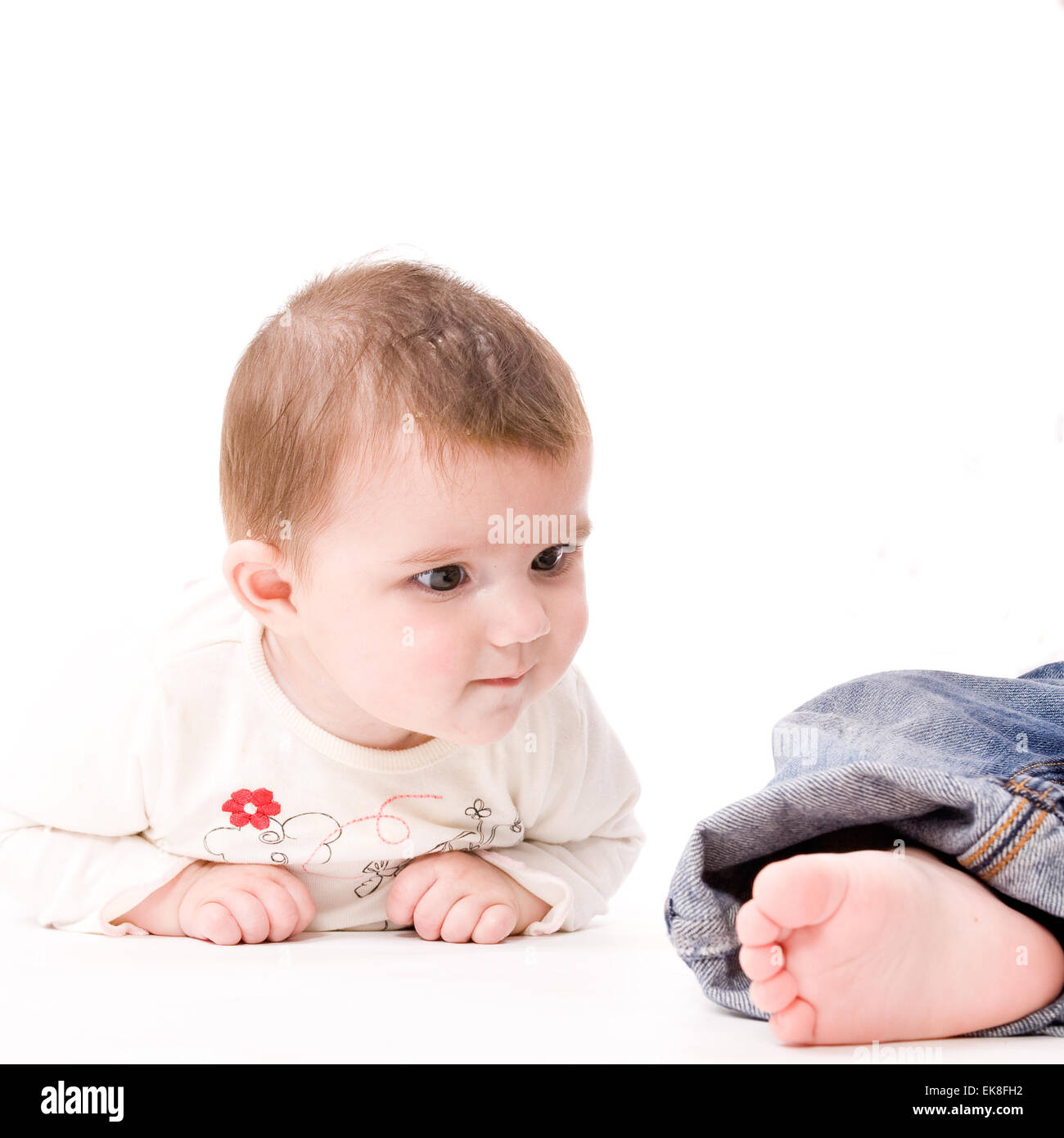 Baby è a pagamento tlooking Foto Stock