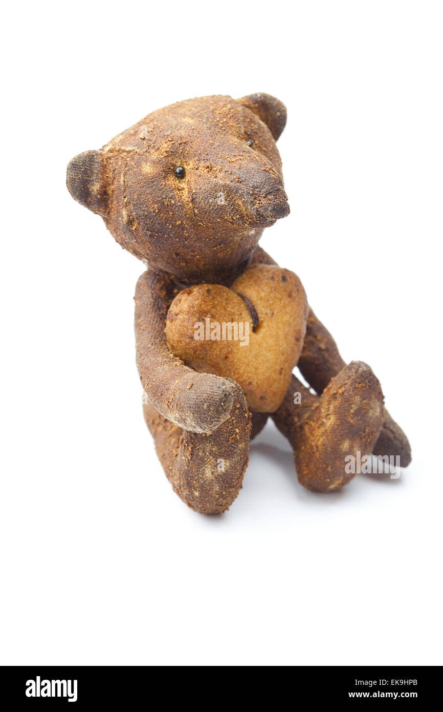 Orsacchiotto di peluche fatte a mano e cookie nella forma di cuore isolato o Foto Stock