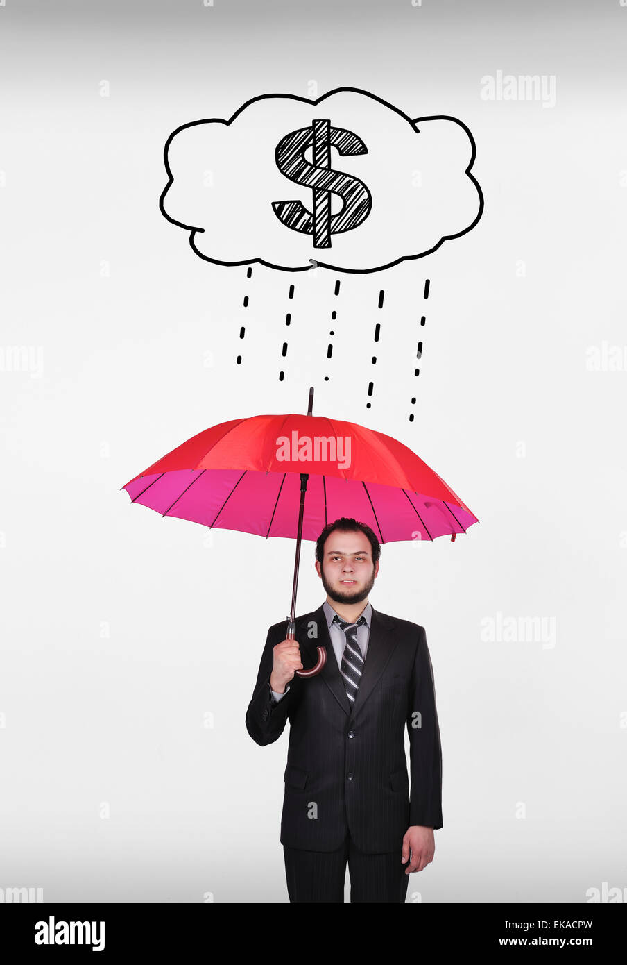 Giovane imprenditore con ombrellone e dollari pioggia Foto Stock