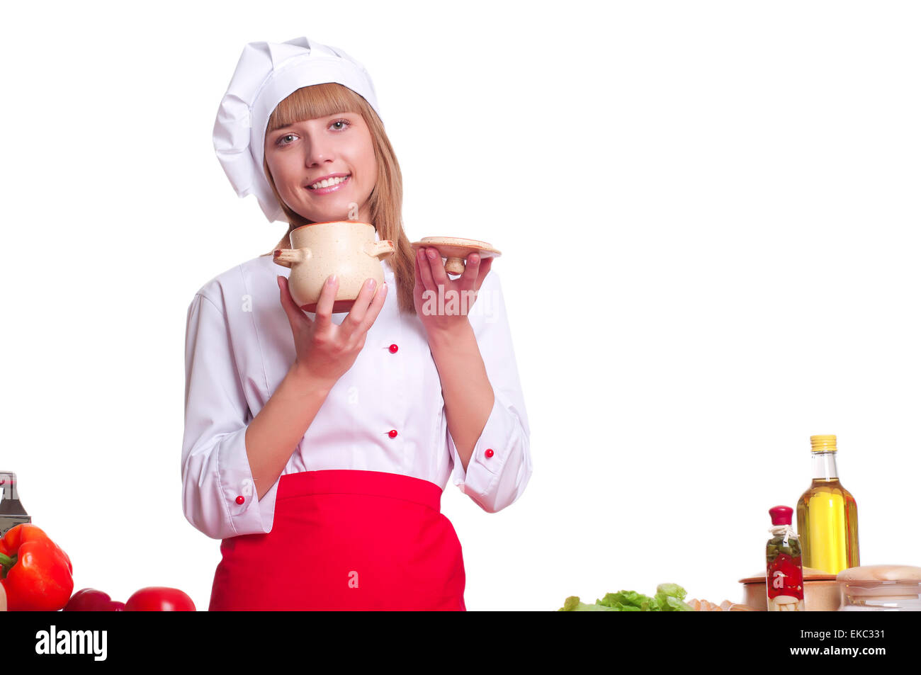 Attraente cucinare una donna su sfondo bianco Foto Stock