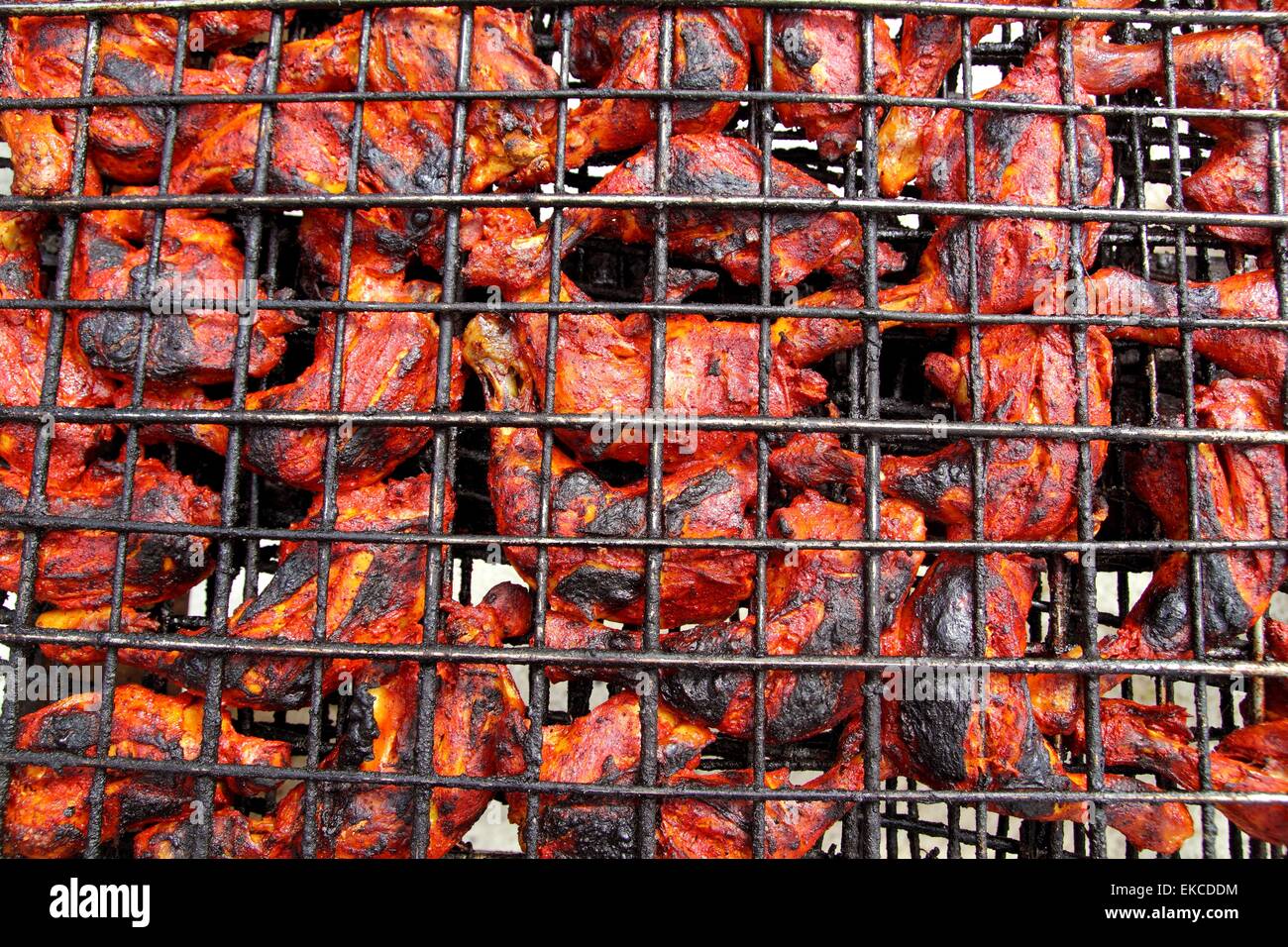 Pollo alla griglia in rosso salsa achiote tikinchik Mayan Foto Stock Pollo alla griglia in rosso salsa achiote tikinchik Mayan Foto Stock