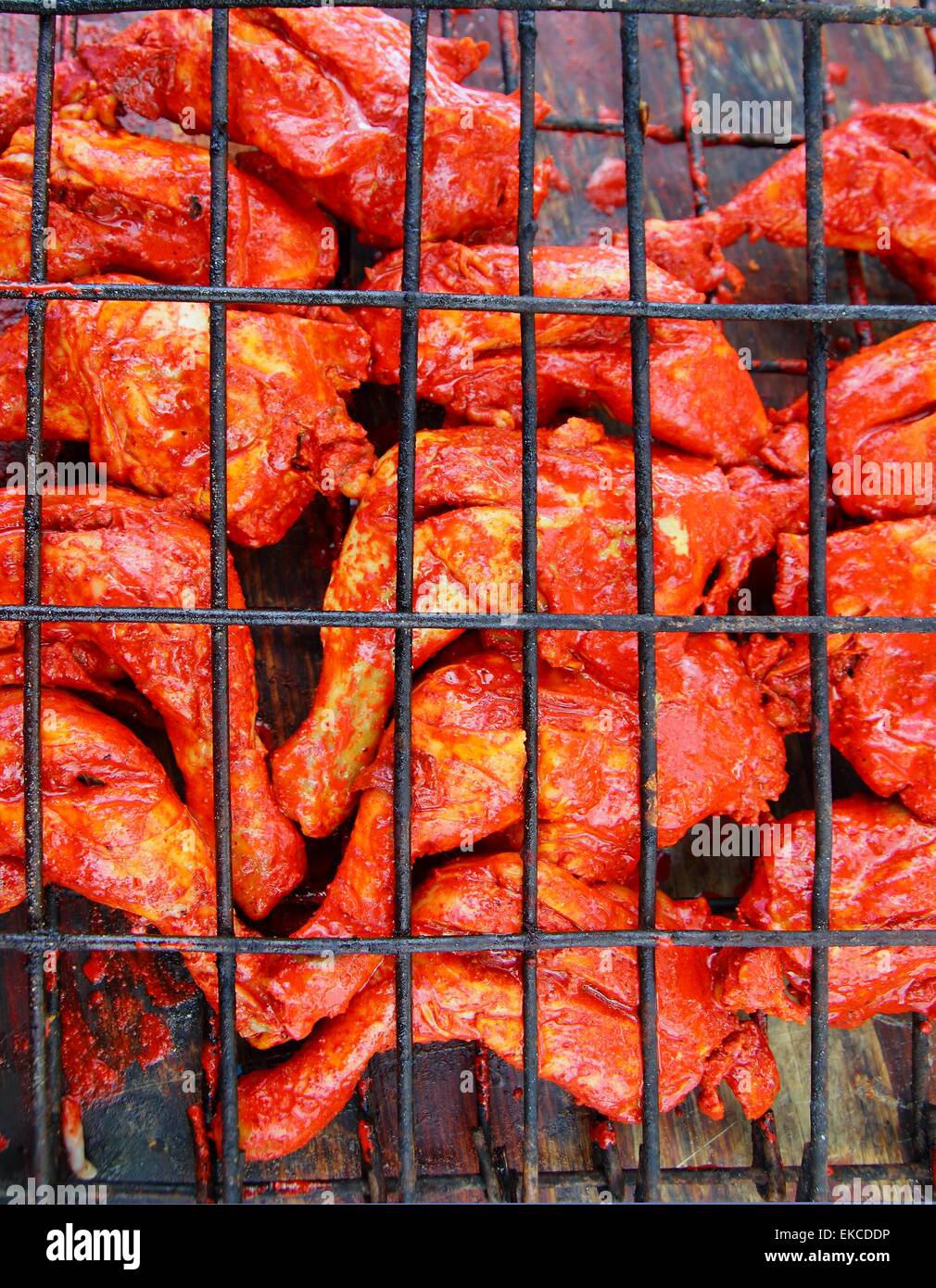 Pollo alla griglia in rosso salsa achiote tikinchik Mayan Foto Stock Pollo alla griglia in rosso salsa achiote tikinchik Mayan Foto Stock