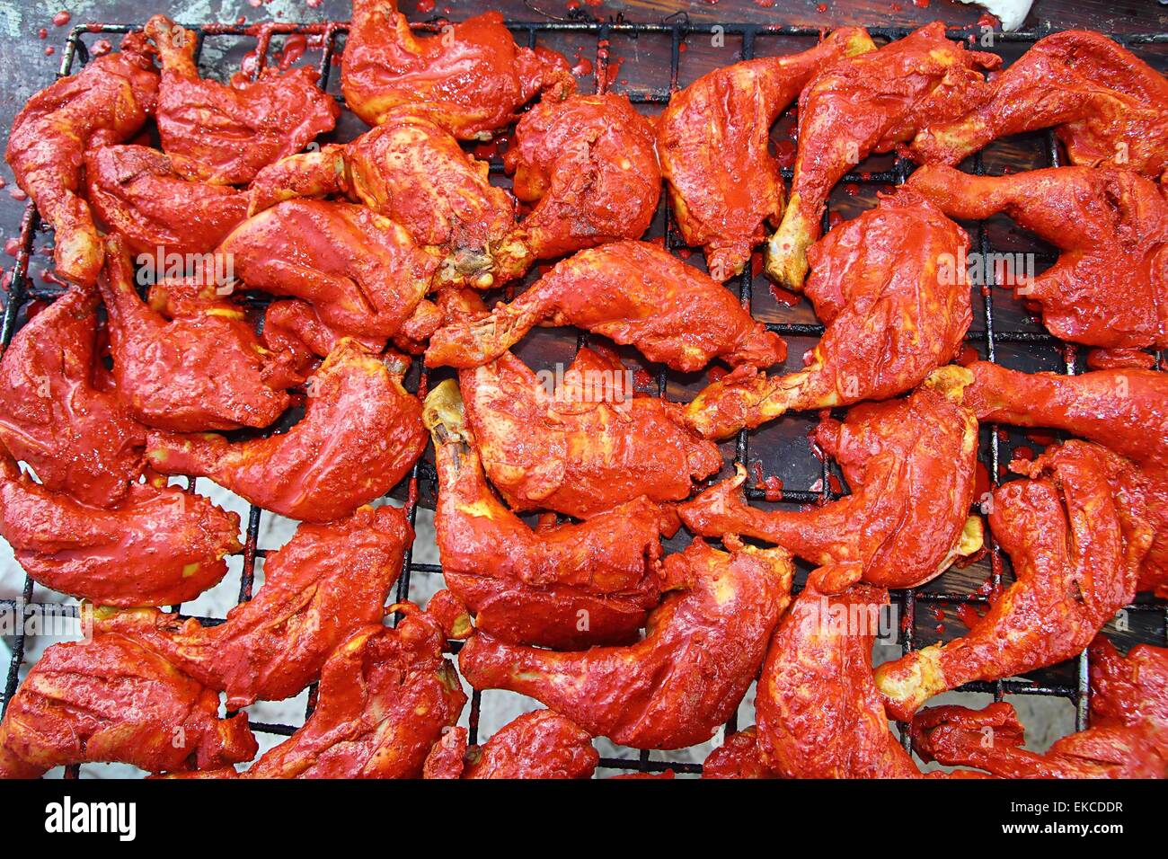 Pollo alla griglia in rosso salsa achiote tikinchik Mayan Foto Stock Pollo alla griglia in rosso salsa achiote tikinchik Mayan Foto Stock