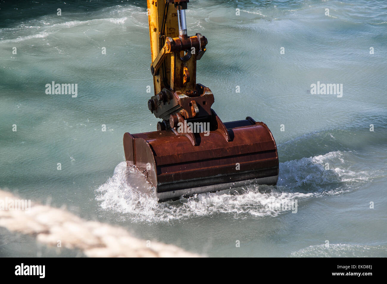 Il dragaggio del porto, St Mary. Foto Stock
