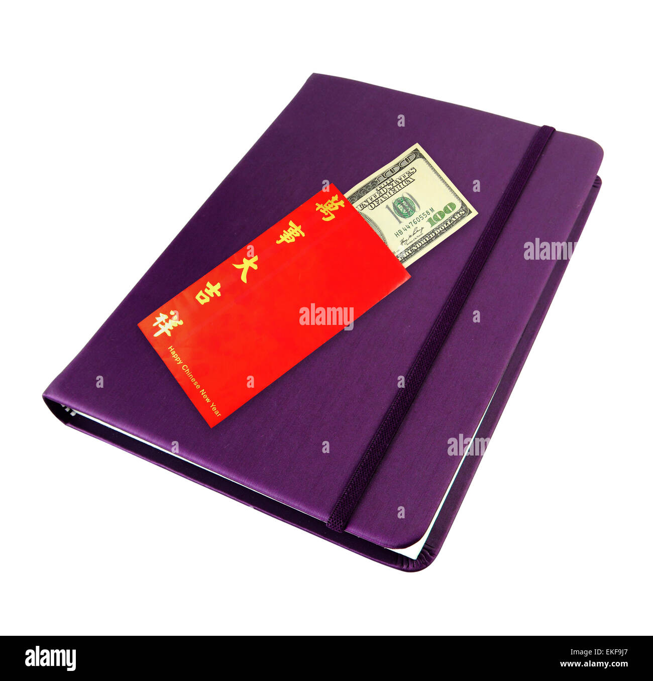 Denaro contante in dollari banconota in busta rossa su viola è il notebook Foto Stock