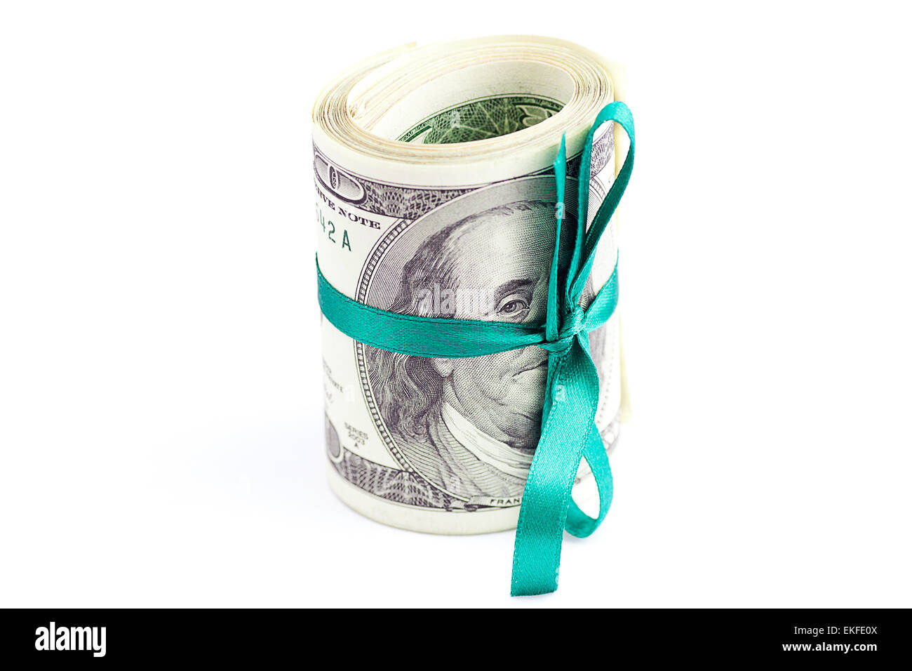 Di dollari arrotolato in un tubo legate con nastro isolato su bianco Foto Stock