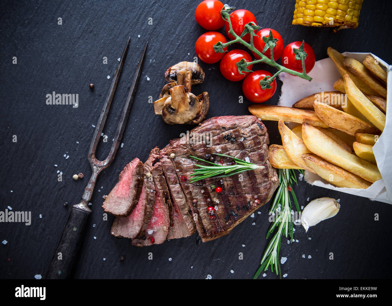Deliziosa bistecca su sfondo di pietra, close-up Foto Stock