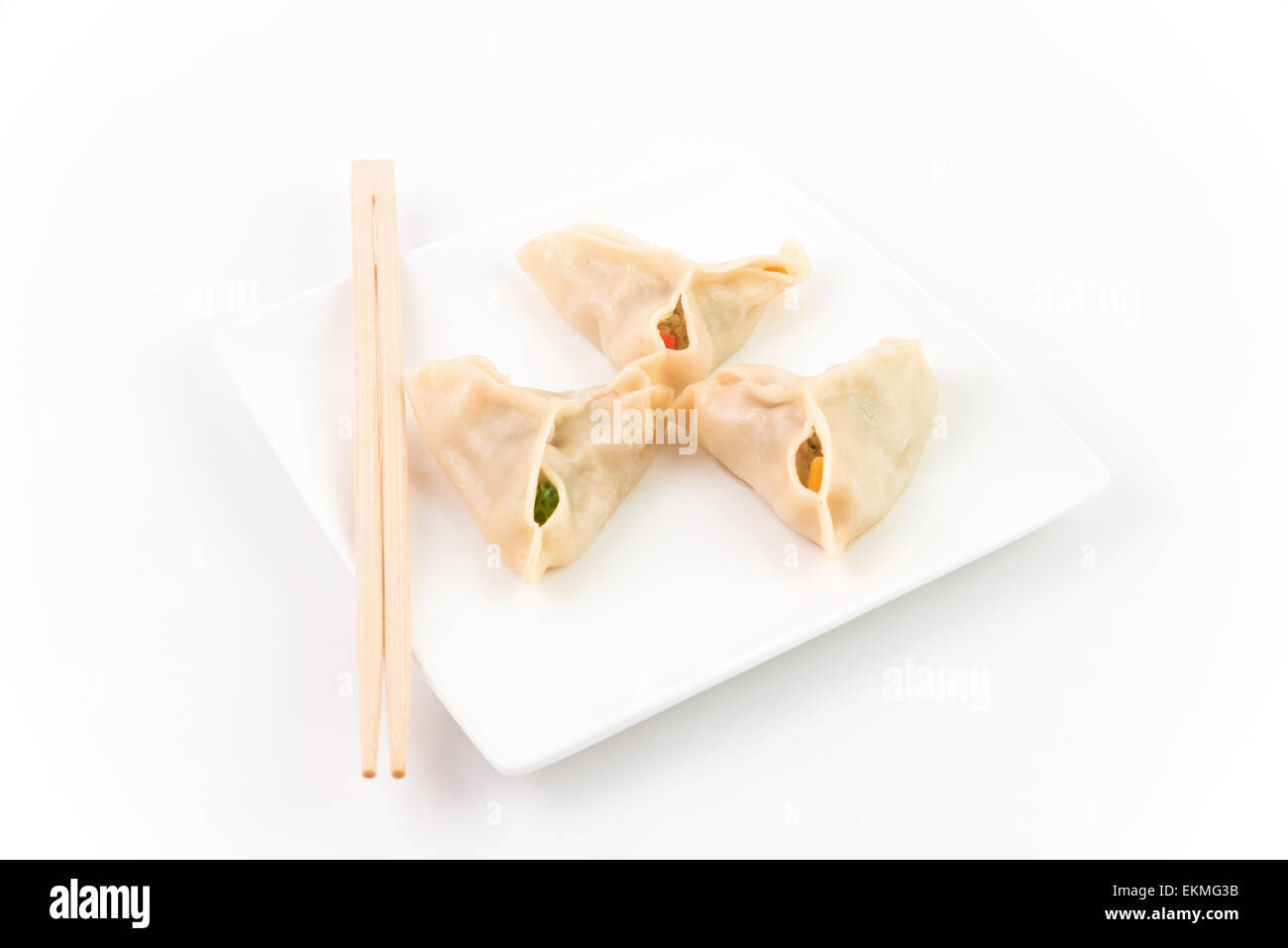 Gnocchi cinesi su sfondo bianco Foto Stock
