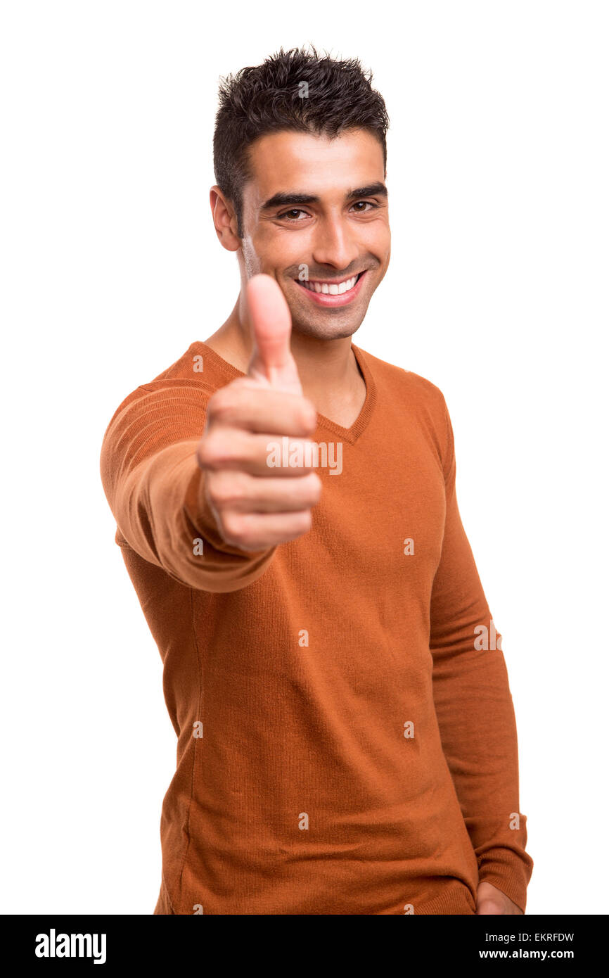 Sorridente guy mostra pollice in alto Foto Stock