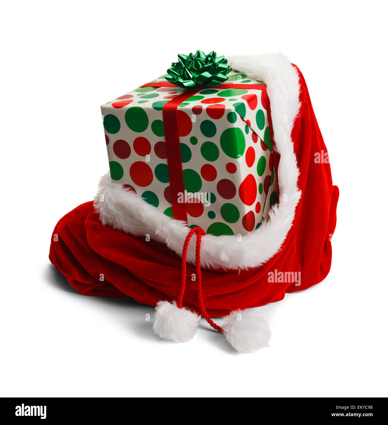 Santa borsa con un ultimo presente isolato su sfondo bianco. Foto Stock
