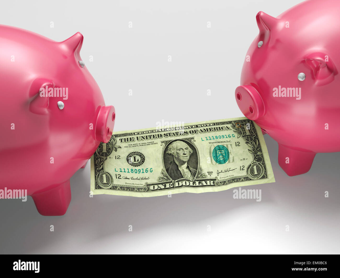 Piggybanks mangiare denaro mostra la crisi finanziaria Foto Stock