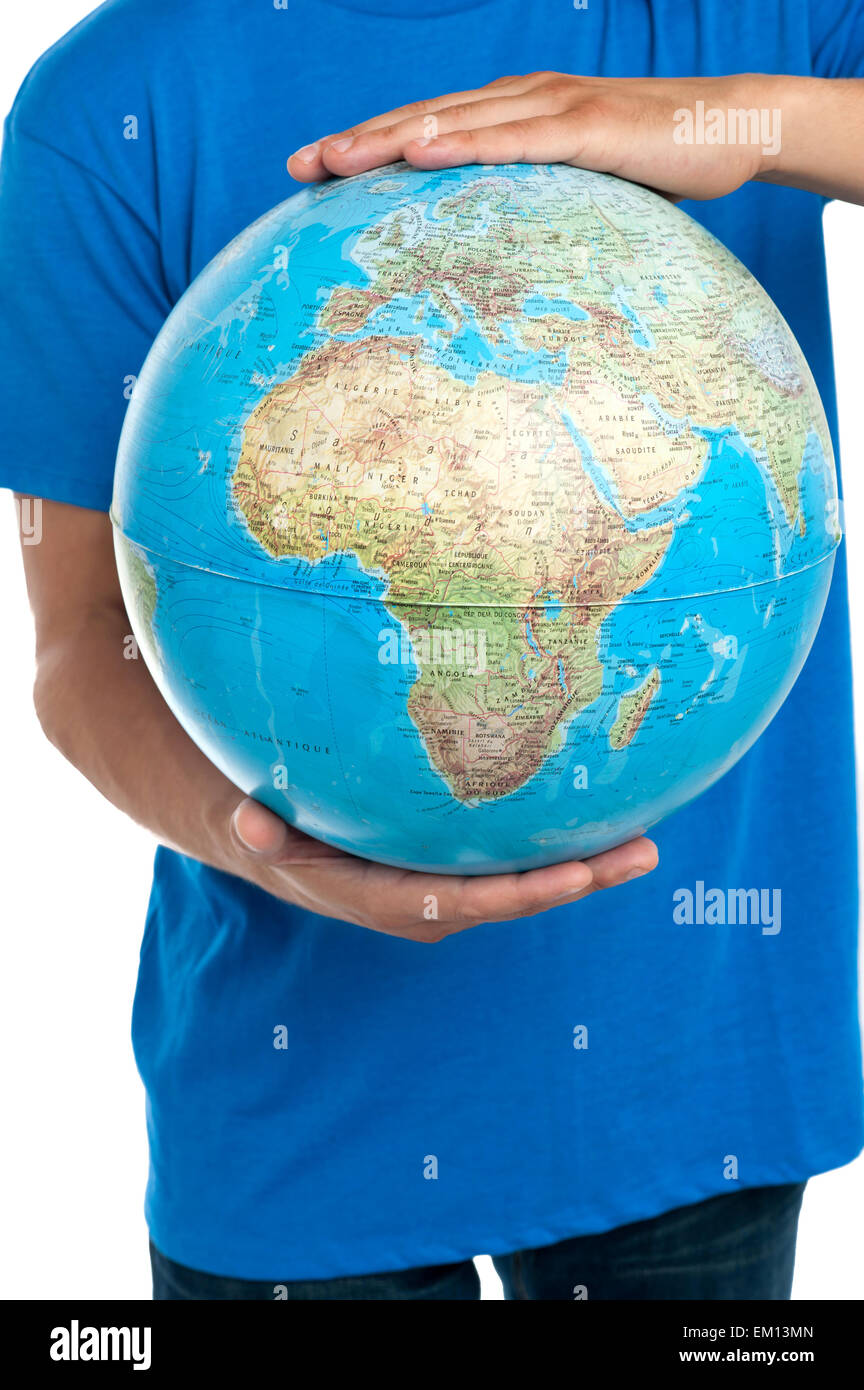 Guy holding globe, closeup shot Foto Stock