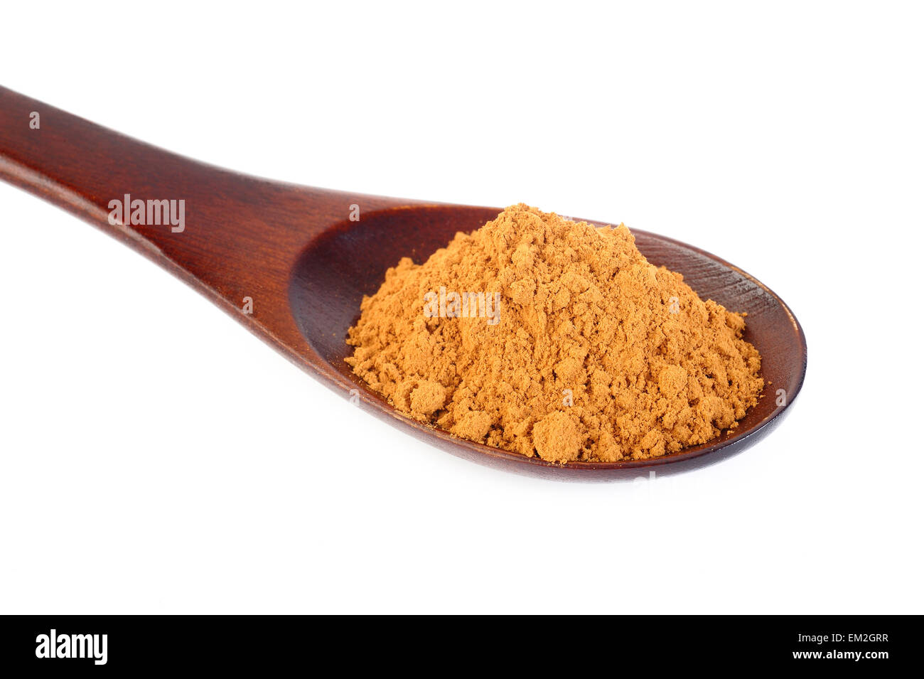 Cannella in polvere sul cucchiaio di legno Foto Stock
