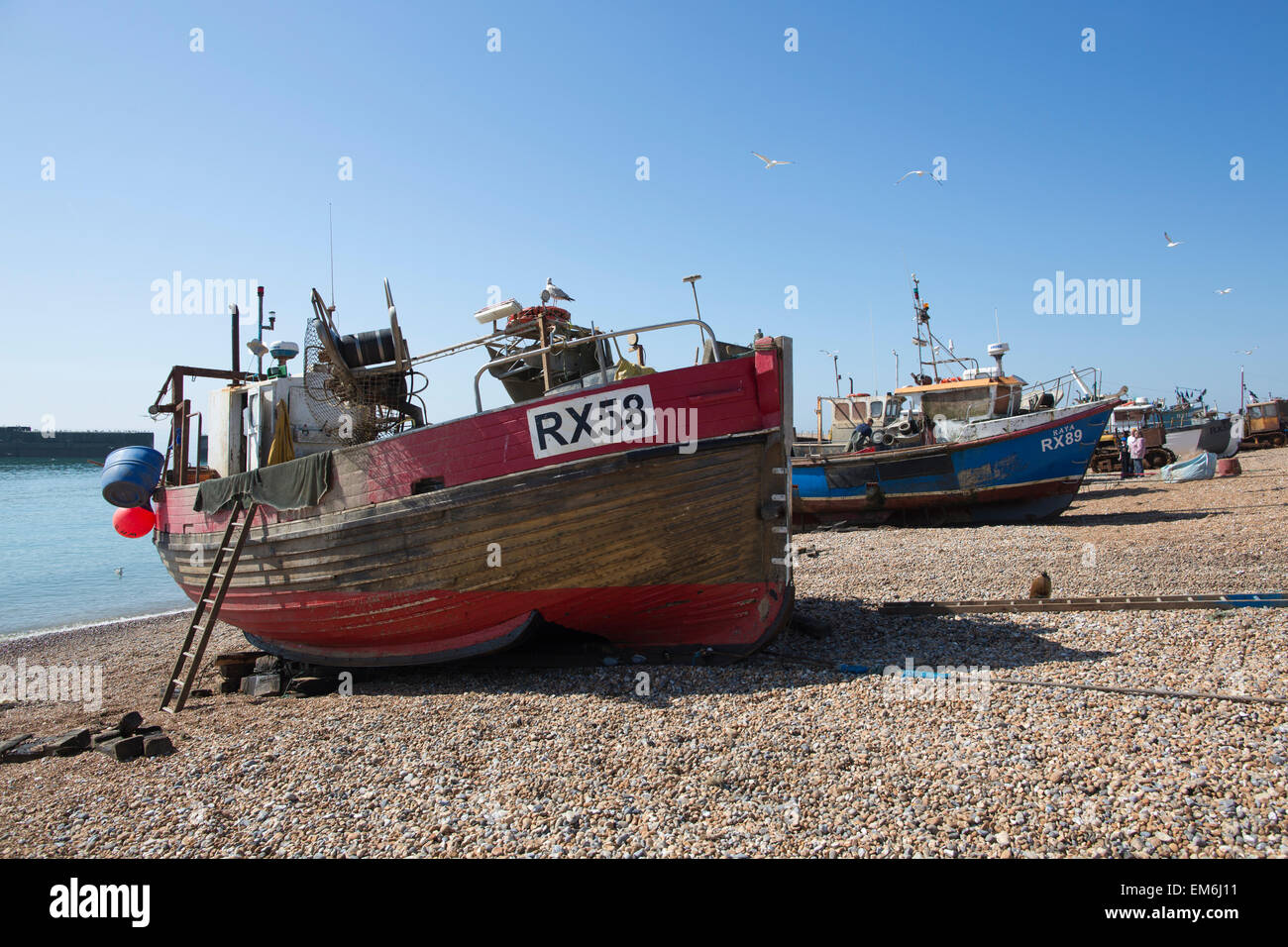 Comunità di pescatori di Hastings, uno dei più antichi porti e più grande spiaggia-lanciato della flotta da pesca in Gran Bretagna, East Sussex, Regno Unito Foto Stock