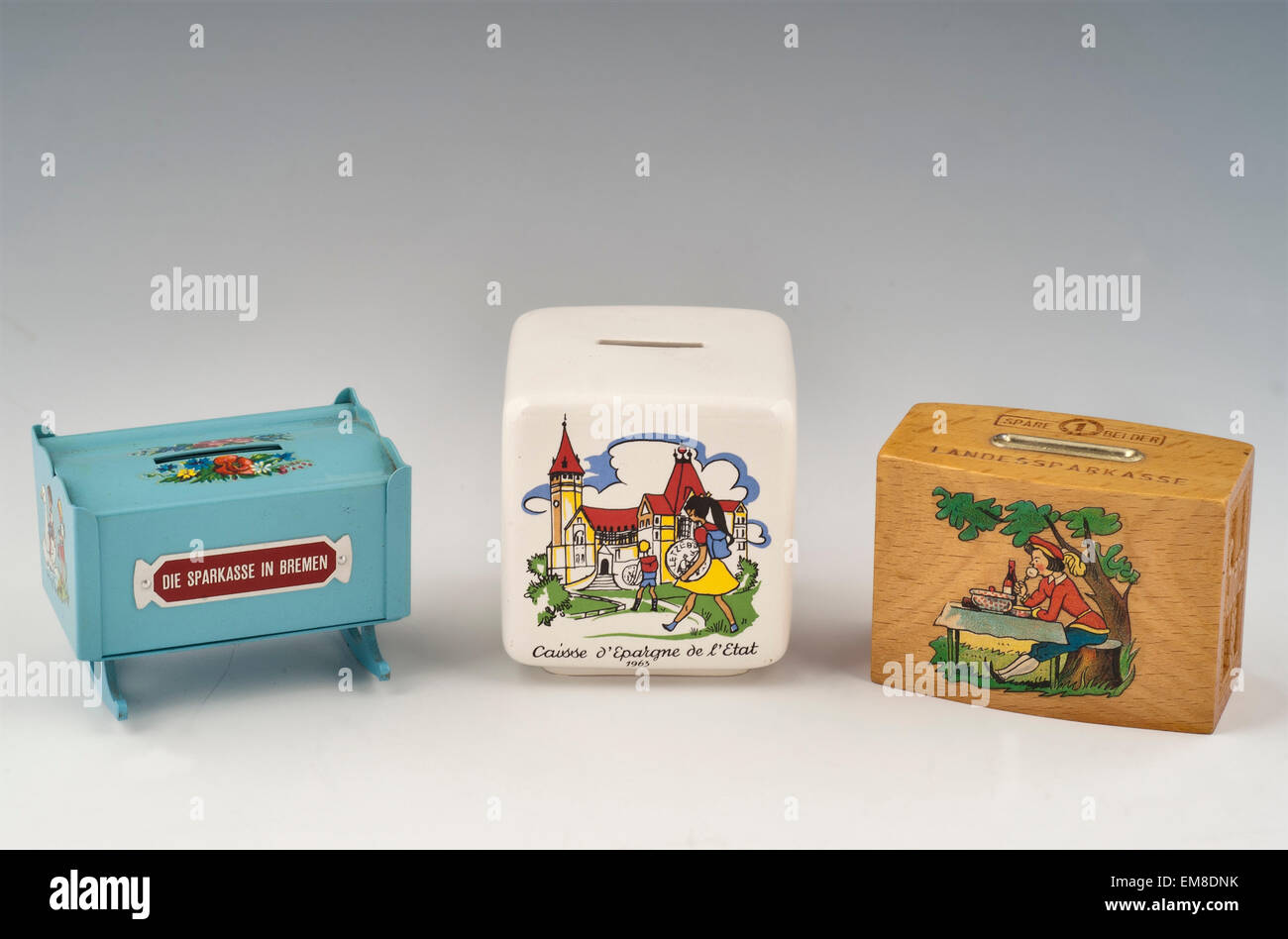 Varie caselle di denaro e piggybank Foto Stock