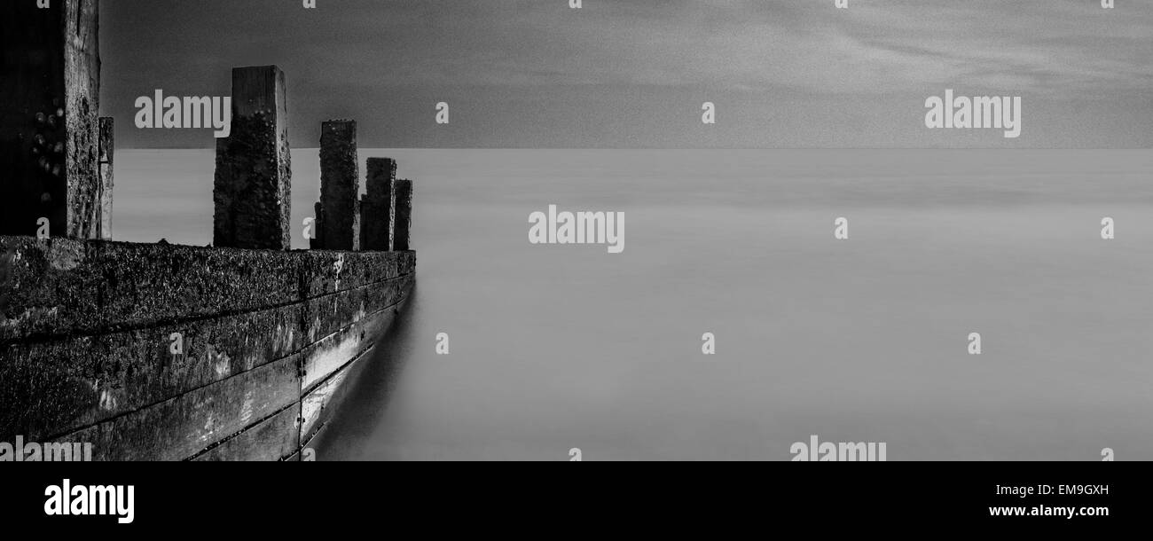 Pennelli a Milford sul mare la sera sun Foto Stock