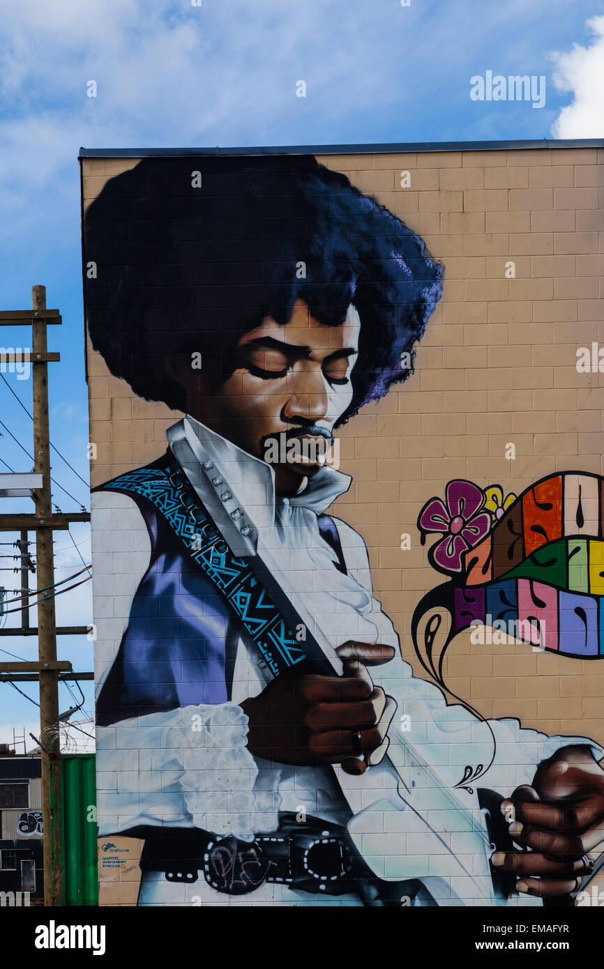 Jimmy Hendrix figura dipinta sulla parete esterna di un edificio nel cuore industriale di Vancouver Foto Stock