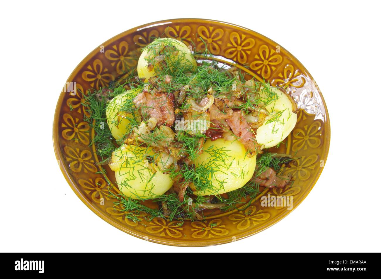 Patate bollite con pancetta fritta ed erbe aromatiche Foto Stock