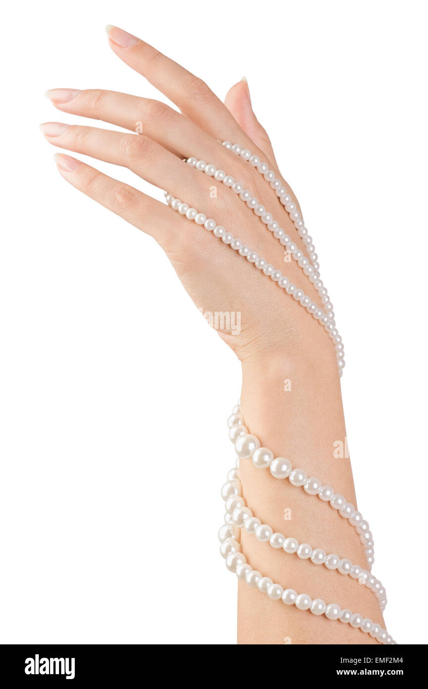 Immagine della bella unghie e dita di donna con perle isolato su bianco Foto Stock
