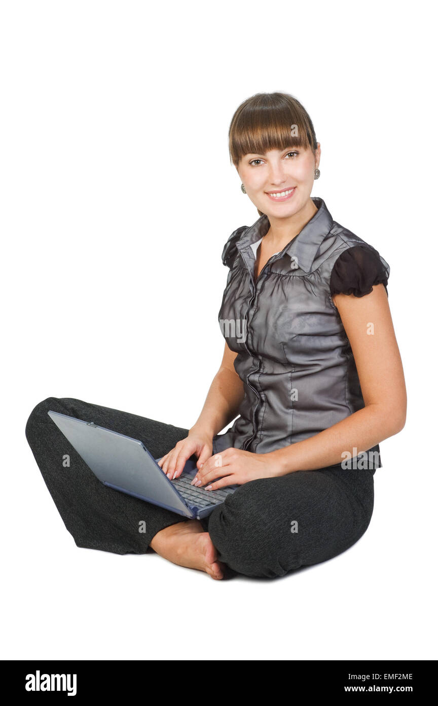 Bella imprenditrice con il computer portatile isolato su sfondo bianco Foto Stock