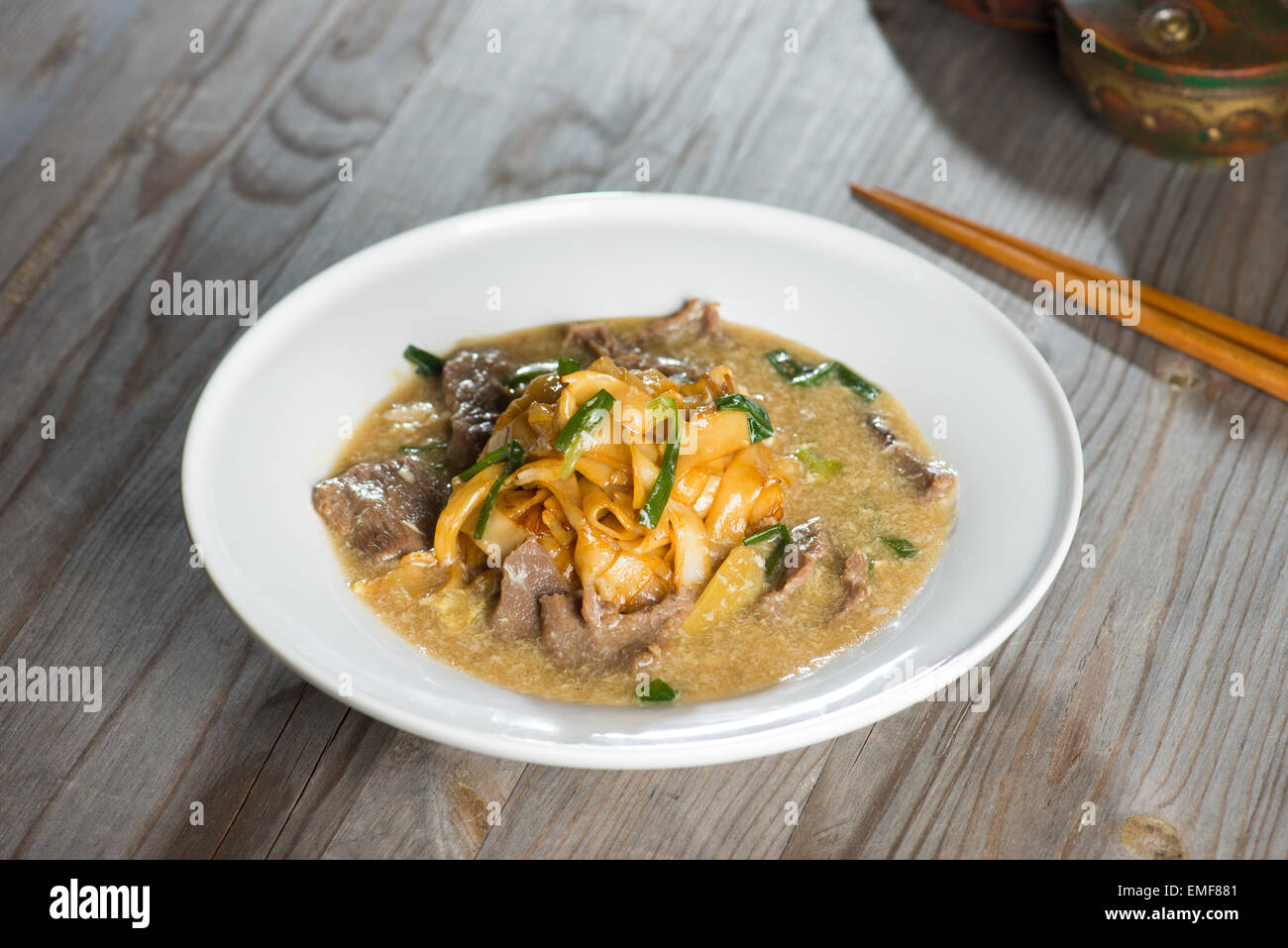 Wat tan hor, popolare cinese cantonese spaghettini fritti nel sud est asiatico Foto Stock