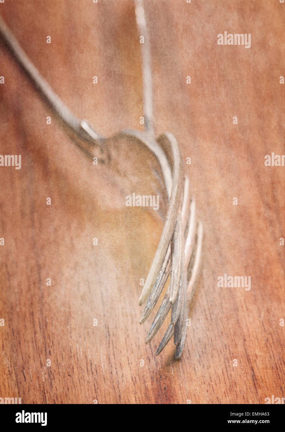 Ancora in vita con due forcelle giacente sul lato vicino. Immagine concettuale di stare insieme, di amore e di intimità. Foto Stock