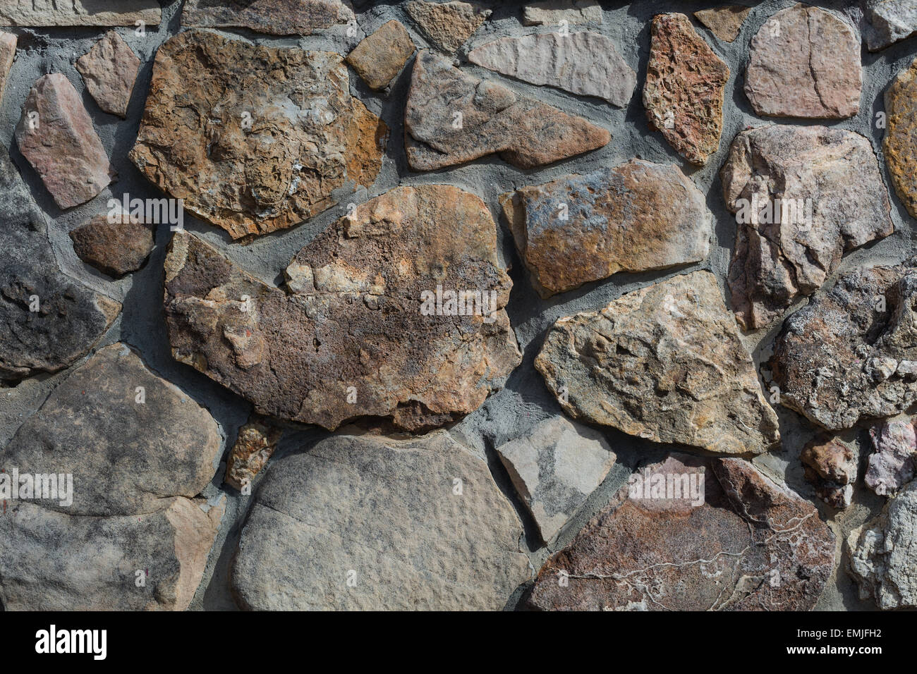 Roccia scura texture di sfondo immagine abstract pietre di fiume Foto Stock