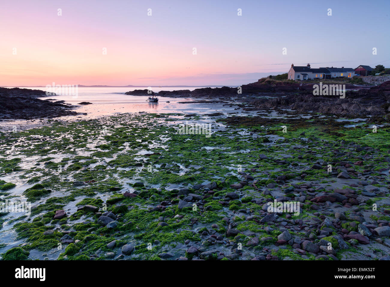 Colroful al tramonto sul mare a St Brides Bay , Pembrokeshire, West Wales. Foto Stock