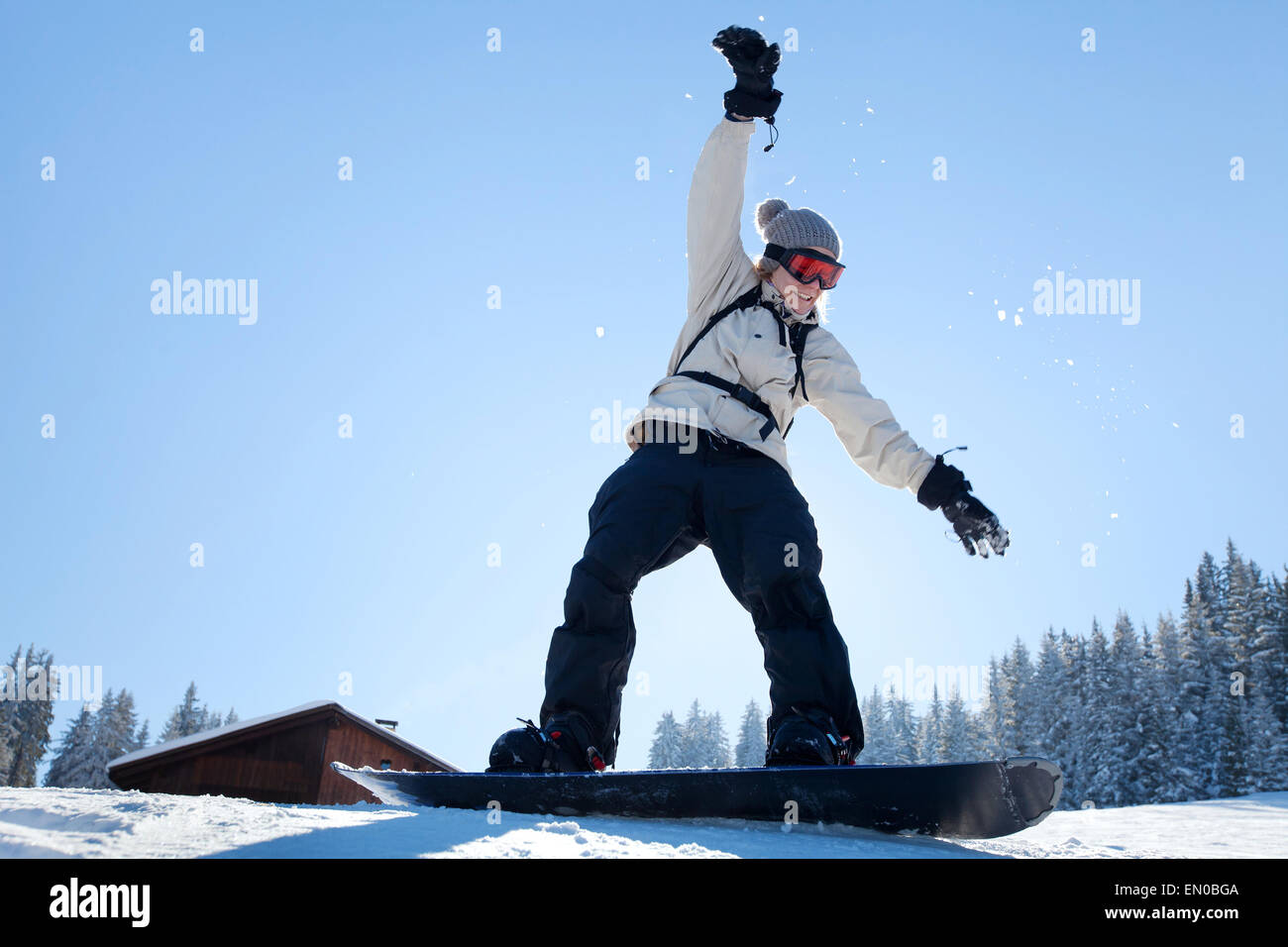 Snowboard di apprendimento, dilettante nella scuola di sci Foto Stock