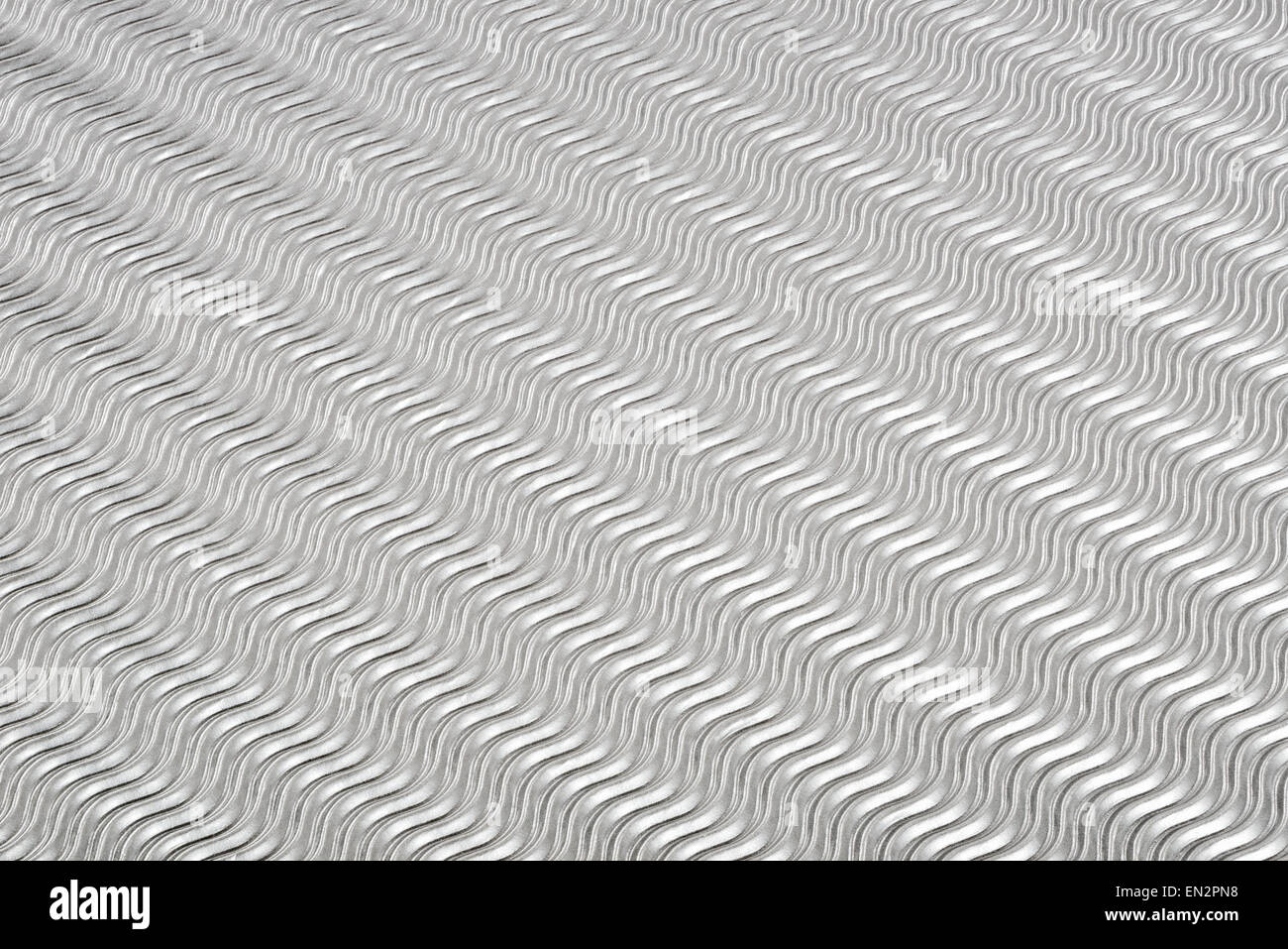 Motivo ondulato argento sfondo metallico Foto Stock