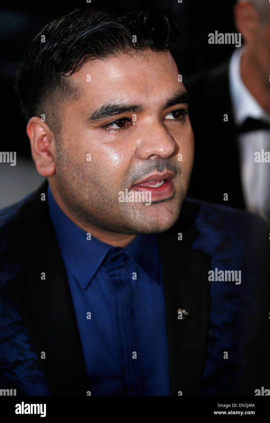 Shahid Khan, noto con il suo nome di fase Naughty Boy, arriva per una cerimonia di premiazione a Londra Aprile 2015 Foto Stock