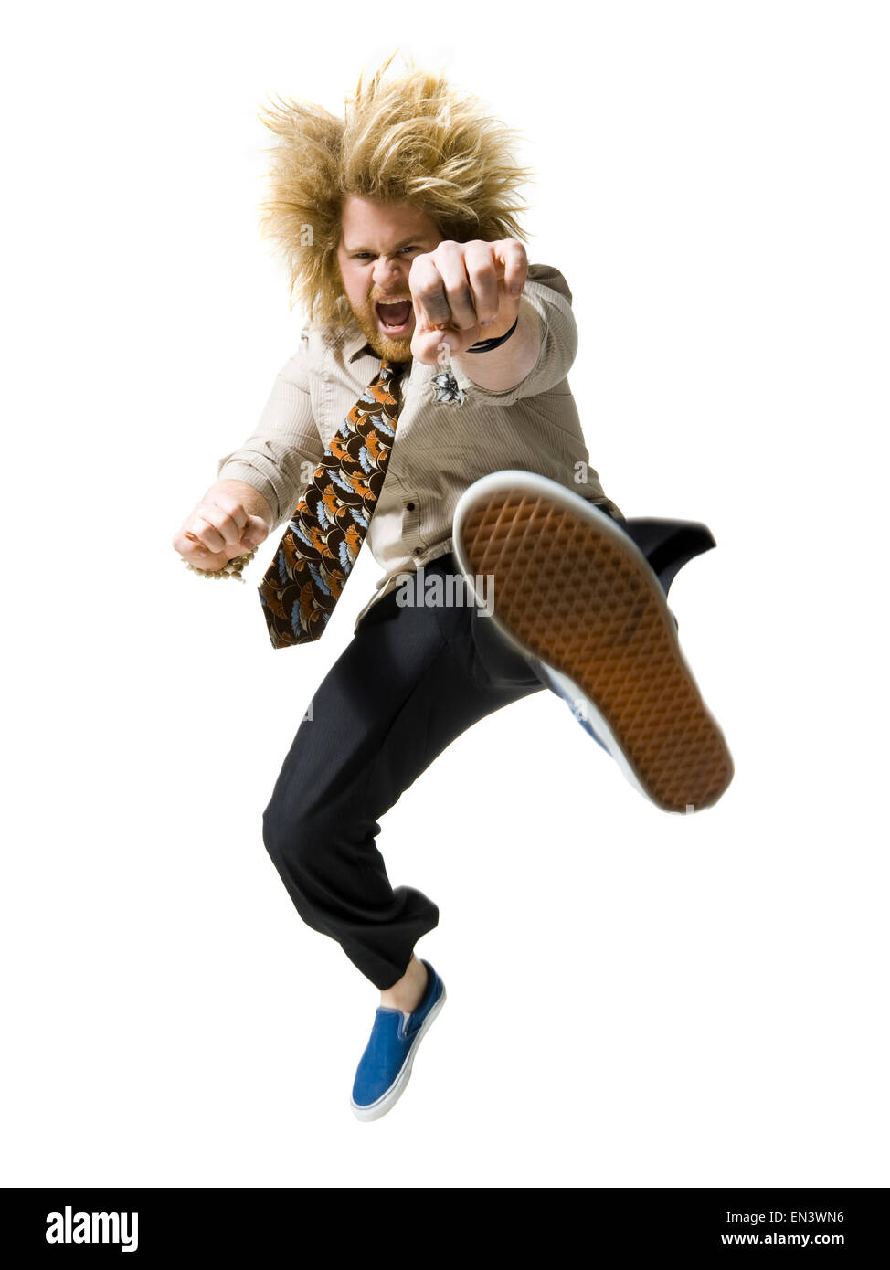 Uomo di calci l'aria Foto Stock