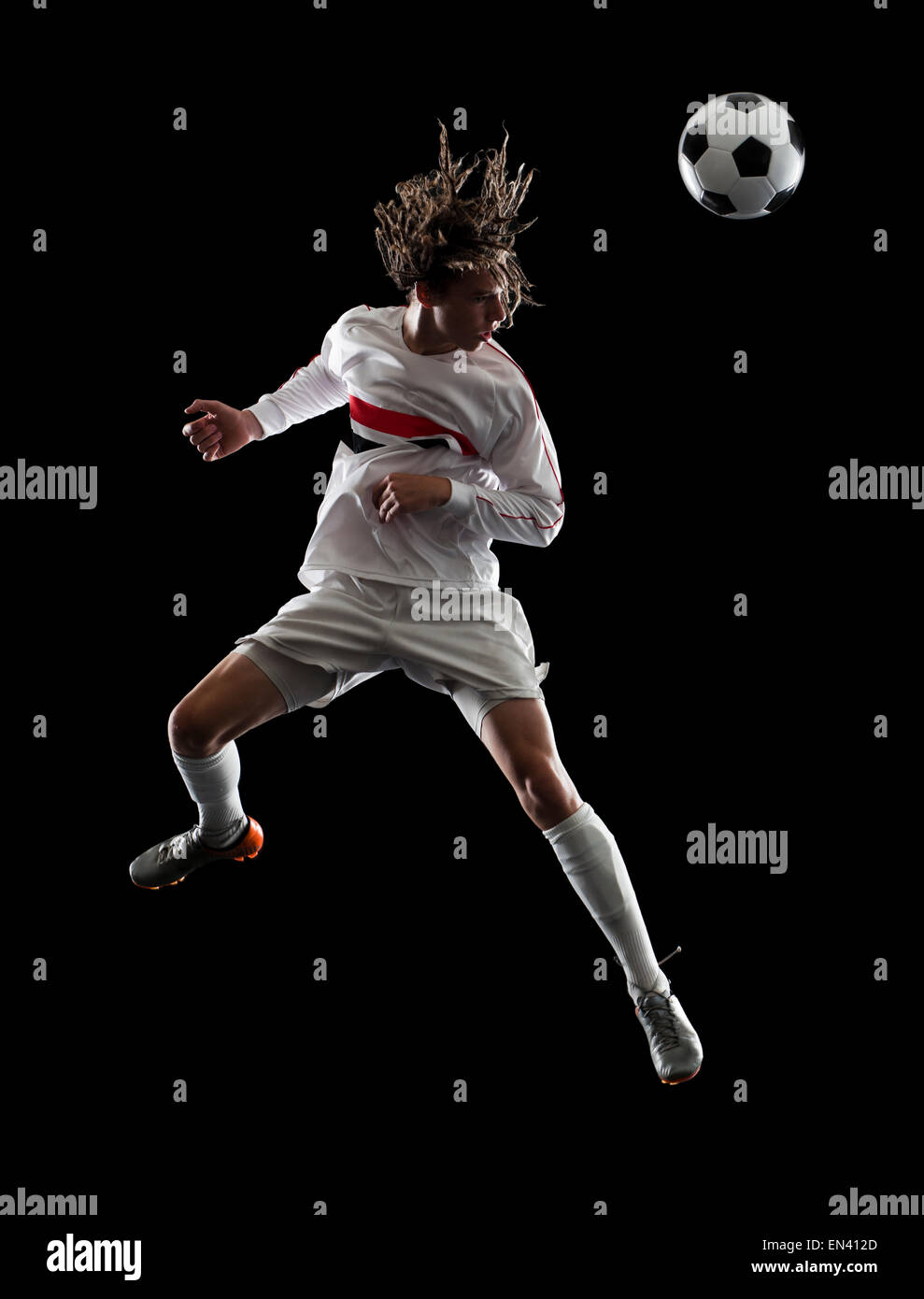 Giocatore di calcio voce la sfera Foto Stock